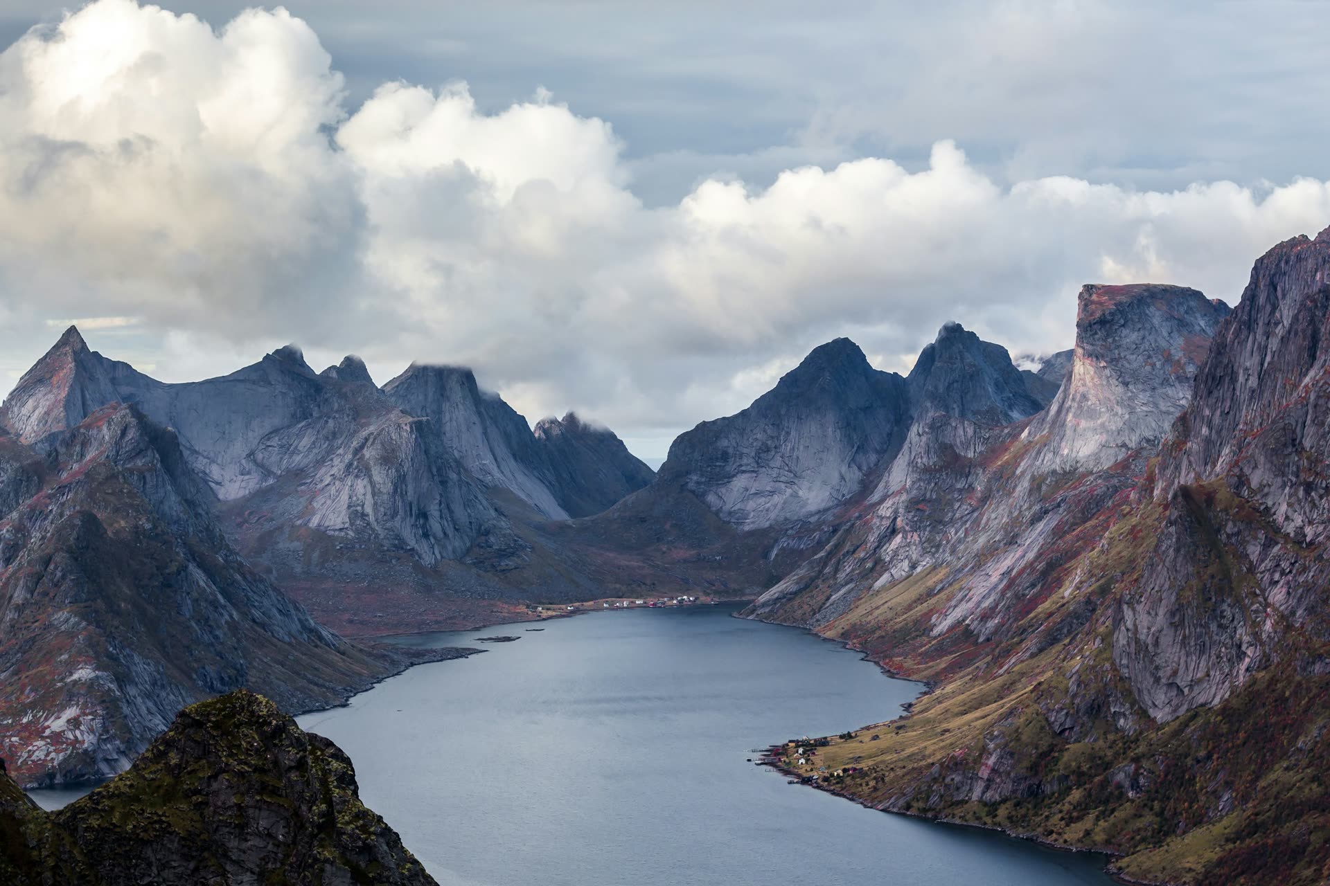 A fjord surrounded by dramatic mountain peaks