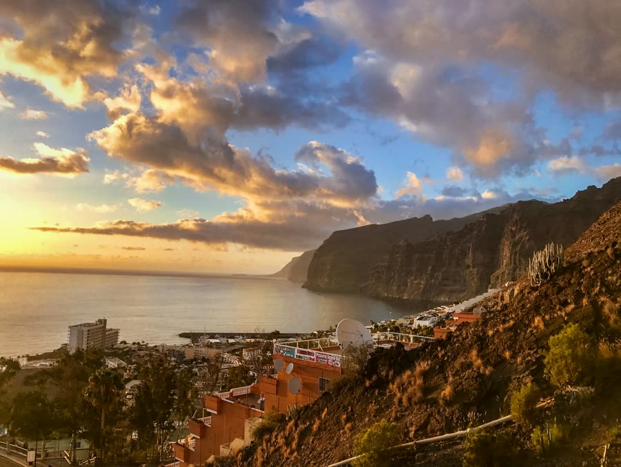 Houses above the sea with Mount Teide in the distance, Tenerife
