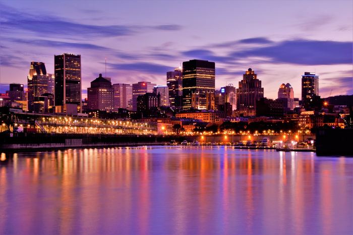 Montréal’s Old Port skyline lit up at dusk